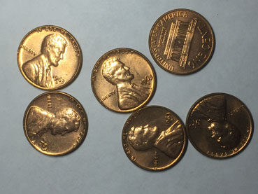 Coin-Rolling-Hunting-Find.-21-Rolls-Of-1963-D-Uncirculated-Pennies